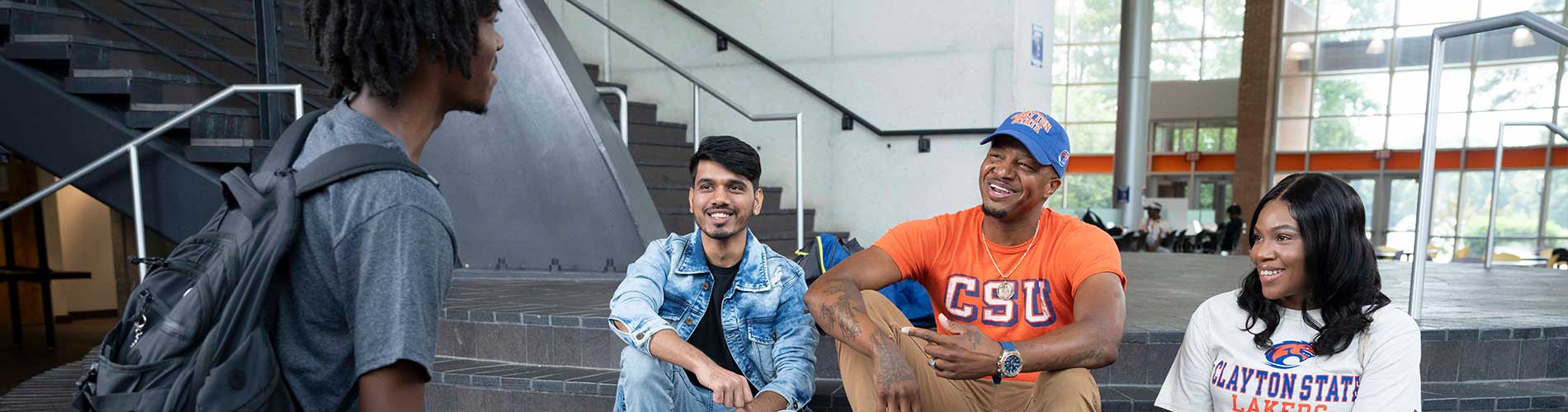 students sitting on steps